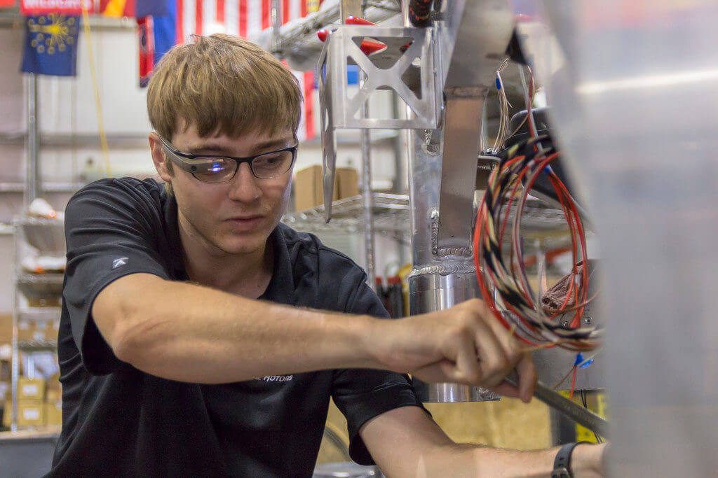 A Local Motors engineer working on Olli